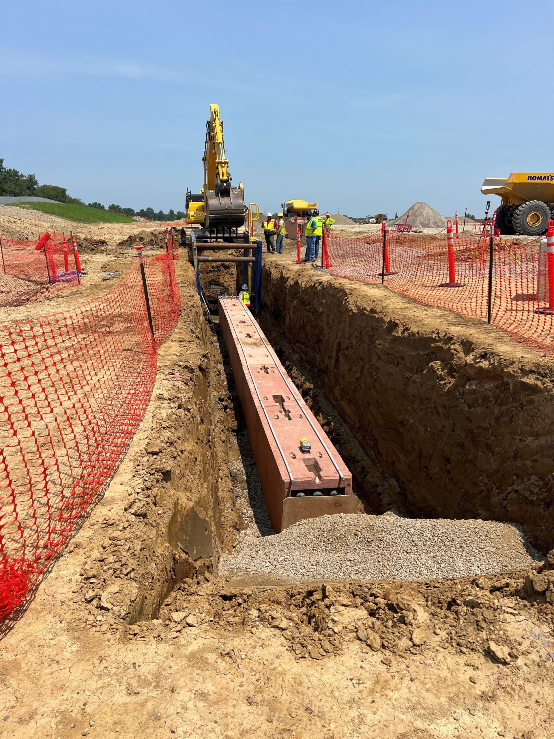 Roman Stone EZ-Key® precast duct bank reinforced with ReforceTech MiniBars™ during installation at an AWS data center project in Kenton, Ohio.
